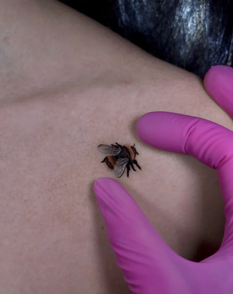 Miniature bumblebee tattoo by Kristina Vishar